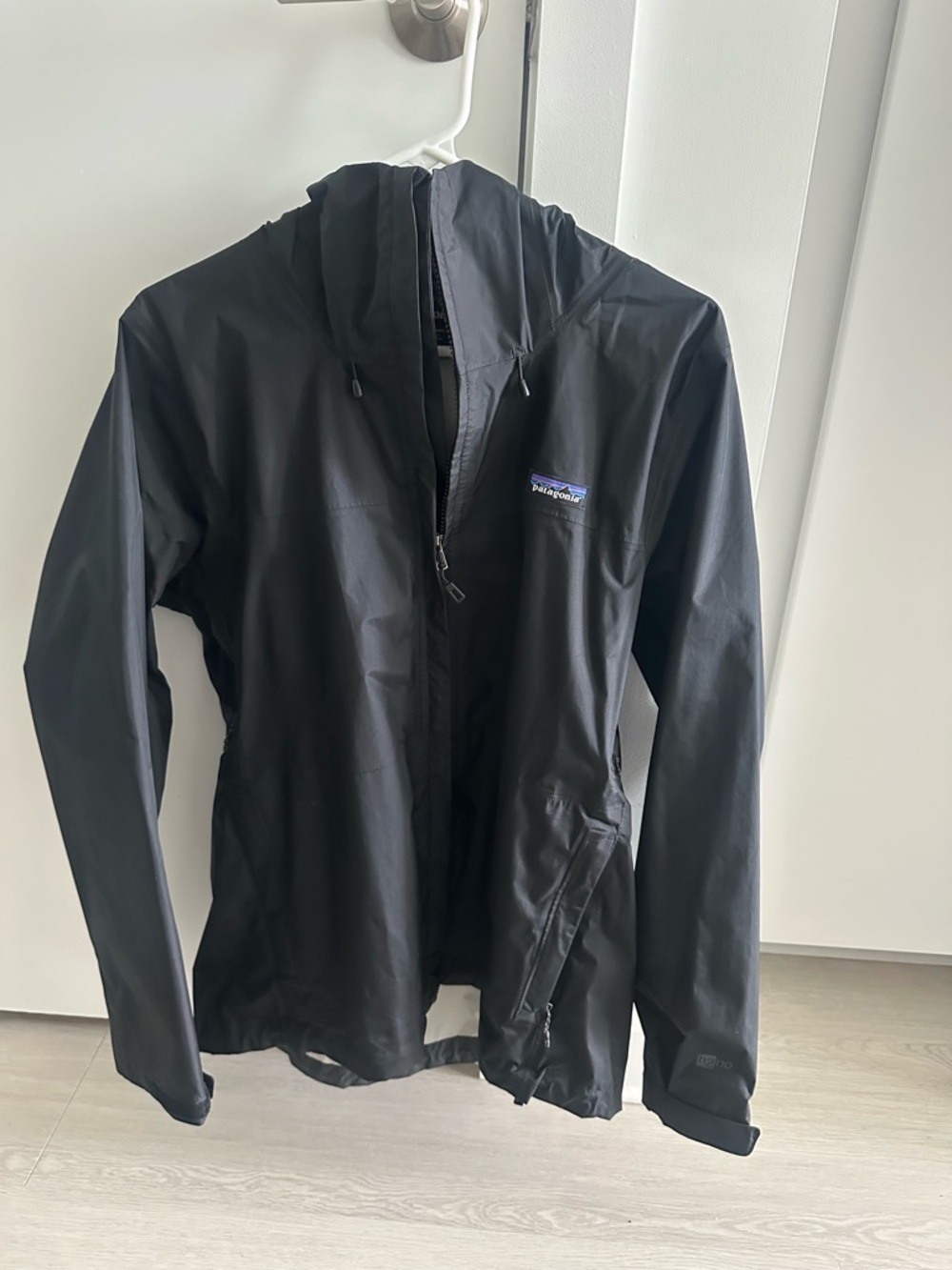 Patagonia Black Jacket with Blue and Purple Logo